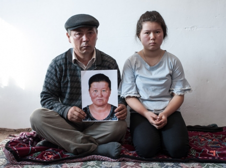 Muralu Tusypjuly and his 13-year-old daughter have been missing their wife and mother since November 2018, who is being held captive in a re-education camp in Xinjiang. The Russian photographer Konstantin Salomatin travelled to Almaty in November 2018 for the following portrait series. / Photo: Konstantin Salomatin, n-ost 